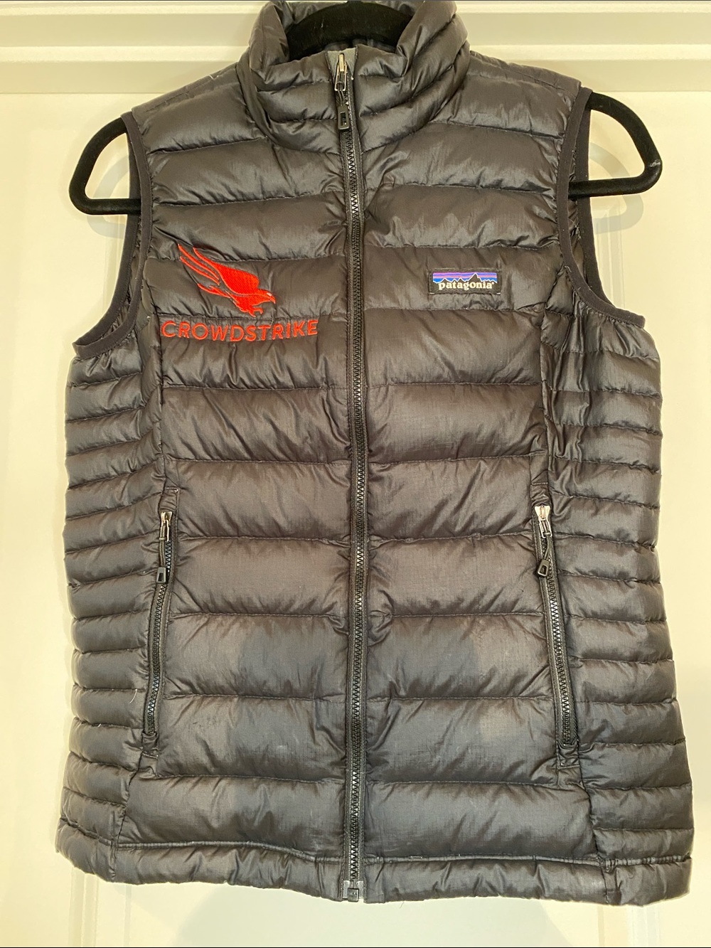 Patagonia Women’s Black Quilted Down Vest with Red CrowdStrike Logo